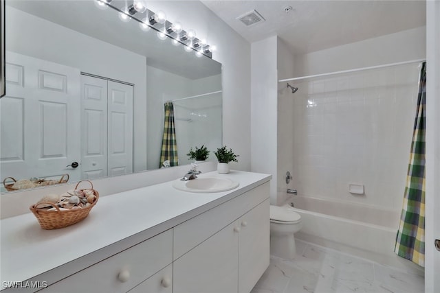 full bathroom with shower / bath combo, vanity, and toilet