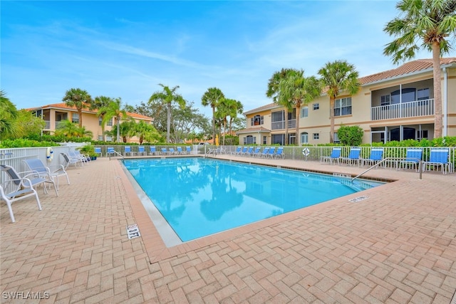 view of pool featuring a patio