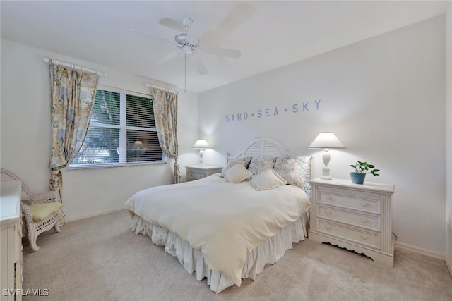 bedroom with light colored carpet and ceiling fan