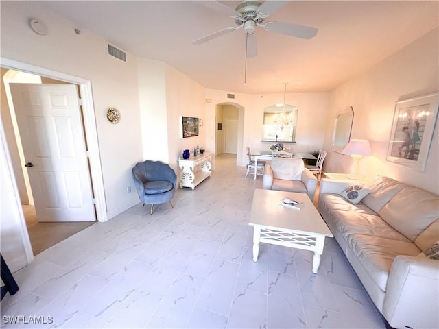 living room with ceiling fan