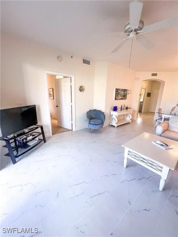 living room with ceiling fan