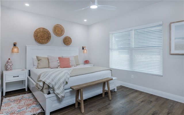 bedroom featuring dark wood-type flooring and ceiling fan