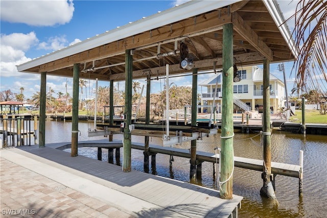 view of dock with a water view