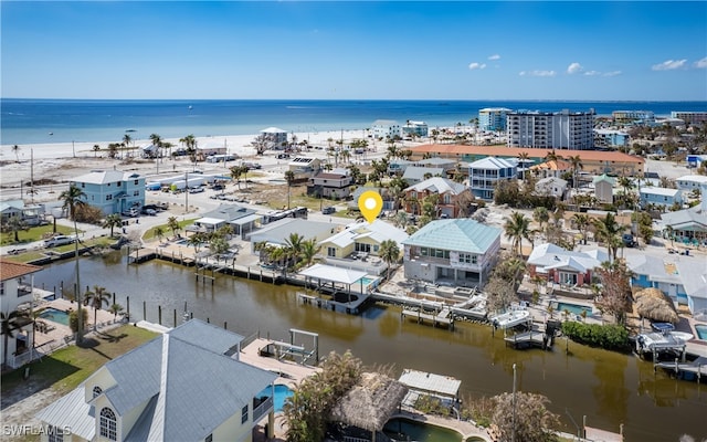 bird's eye view with a water view