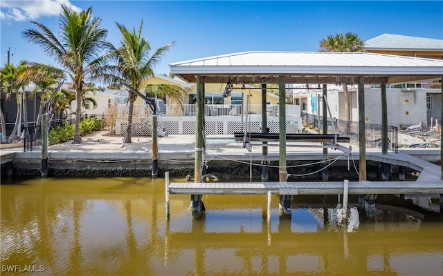 dock area with a water view