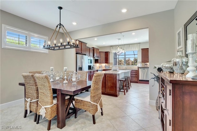 dining room featuring light tile patterned floors