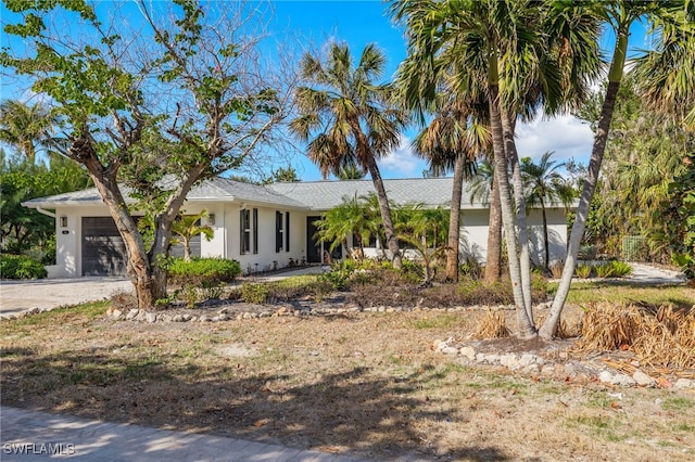 view of front of home with a garage