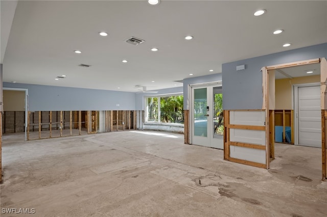 spare room featuring french doors