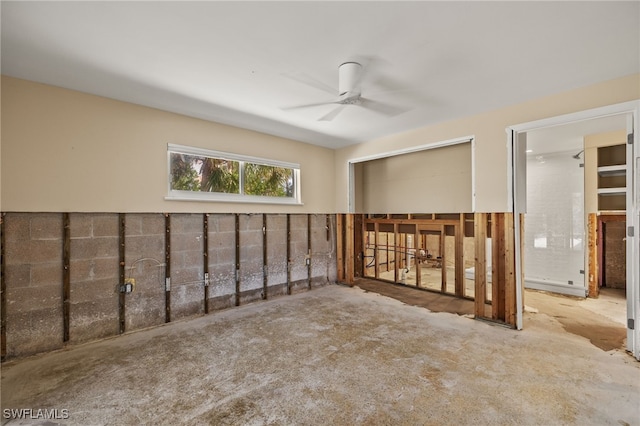 interior space featuring ceiling fan