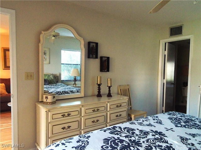 bedroom featuring visible vents