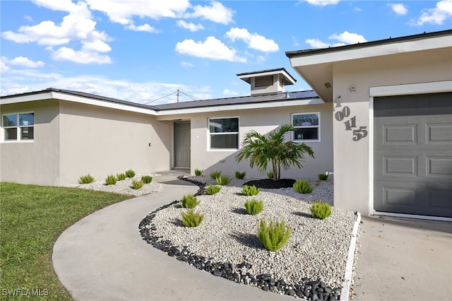 property entrance featuring a garage