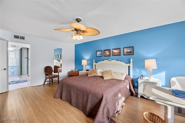 bedroom featuring light hardwood / wood-style flooring and ceiling fan