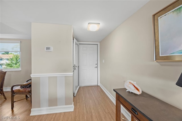 doorway with light hardwood / wood-style flooring