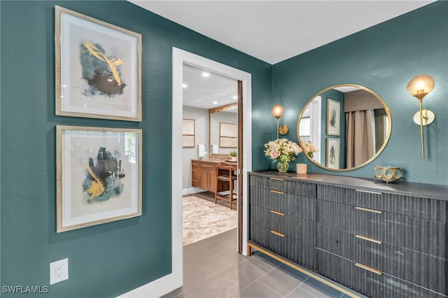 bathroom with vanity and tile patterned floors