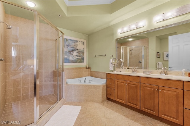 bathroom with vanity, independent shower and bath, and tile patterned flooring