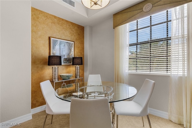 dining room featuring light tile patterned floors