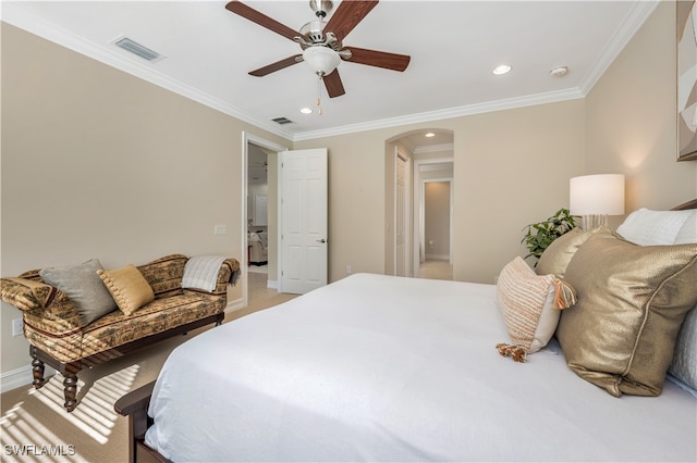 bedroom featuring ceiling fan and crown molding