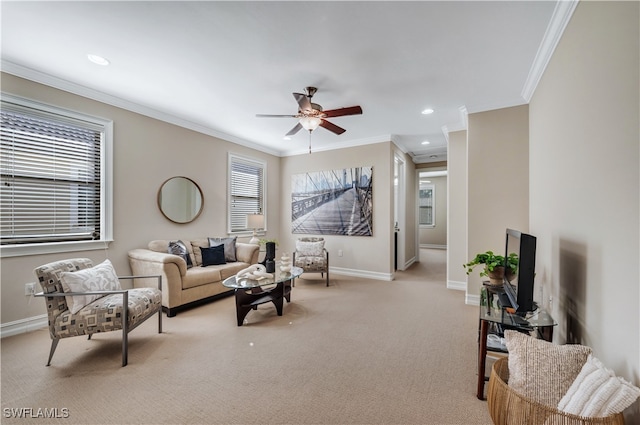 living room featuring crown molding, light carpet, and plenty of natural light