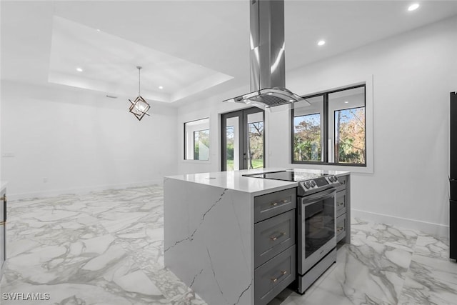3421 16th Ave NE, Naples, FL 34120 - kitchen with baseboards, recessed lighting, a raised ceiling, island exhaust hood, and electric stove