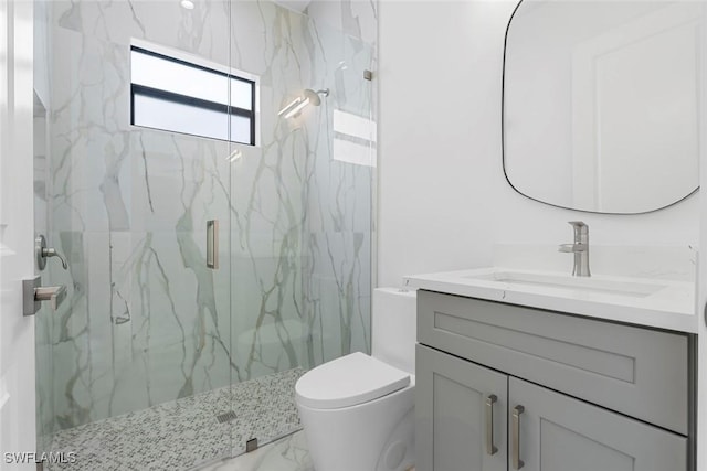 3421 16th Ave NE, Naples, FL 34120 - full bathroom featuring a marble finish shower, vanity, toilet, and marble finish floor