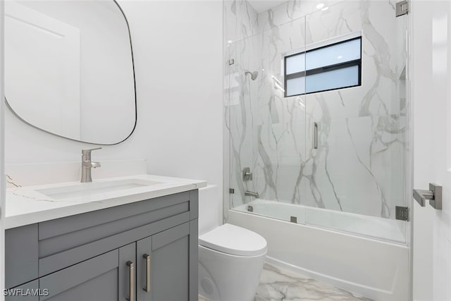 full bathroom with vanity, toilet, and enclosed tub / shower combo