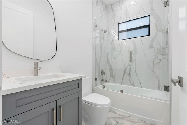 3421 16th Ave NE, Naples, FL 34120 - full bath with bath / shower combo with glass door, vanity, toilet, and marble finish floor