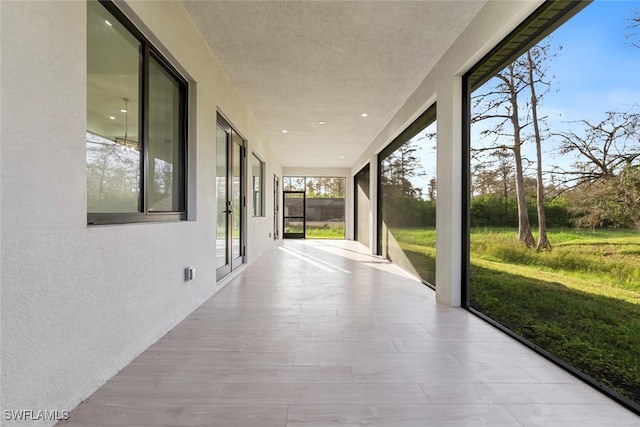 view of unfurnished sunroom