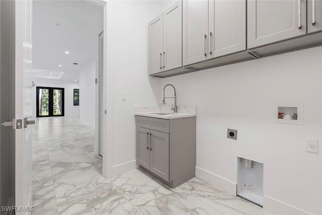 3421 16th Ave NE, Naples, FL 34120 - laundry area featuring baseboards, a sink, marble finish floor, and hookup for an electric dryer