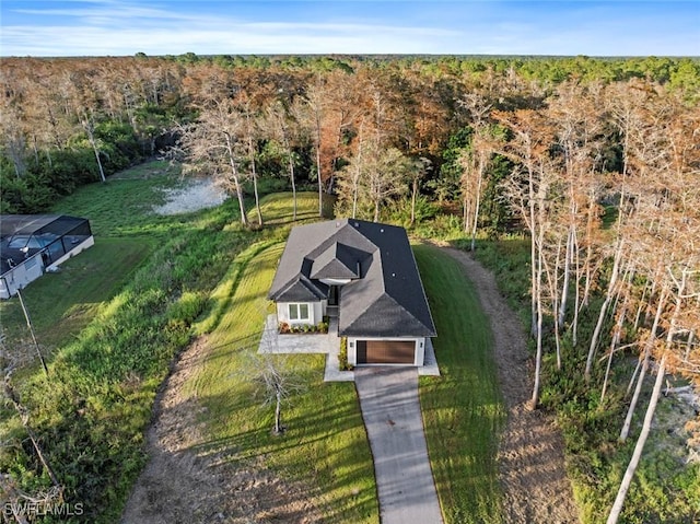 3421 16th Ave NE, Naples, FL 34120 - drone / aerial view with a water view and a forest view