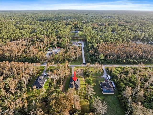 3421 16th Ave NE, Naples, FL 34120 - aerial view featuring a forest view