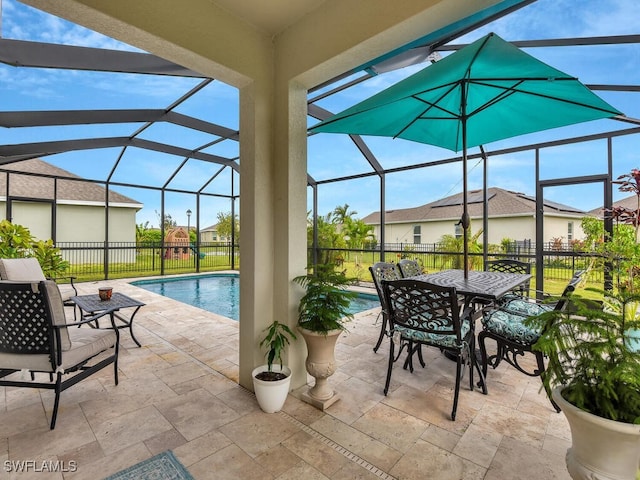 2739 Merida Ln, Cape Coral, FL 33909 - view of pool with glass enclosure, a patio area, and a fenced in pool