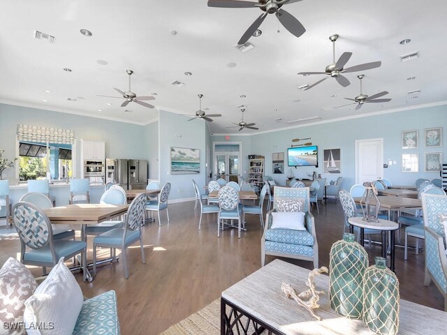2739 Merida Ln, Cape Coral, FL 33909 - living area featuring a ceiling fan, visible vents, and ornamental molding