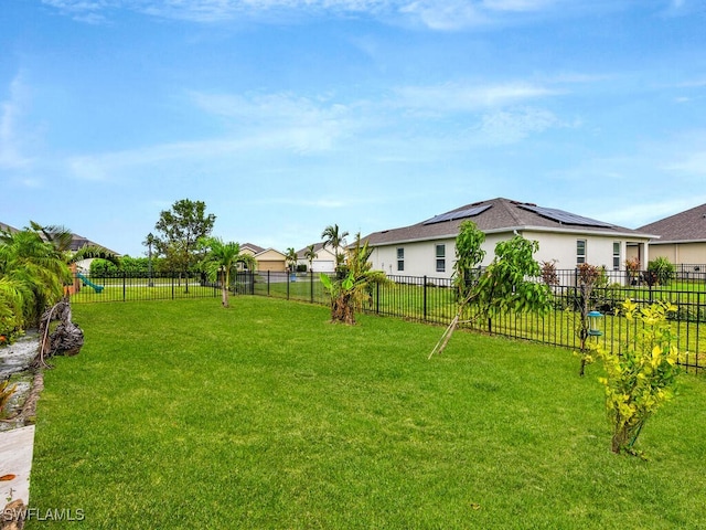 2739 Merida Ln, Cape Coral, FL 33909 - view of yard with a fenced backyard