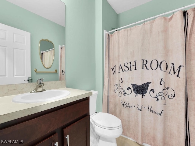 2739 Merida Ln, Cape Coral, FL 33909 - bathroom featuring toilet, vanity, and a shower with curtain