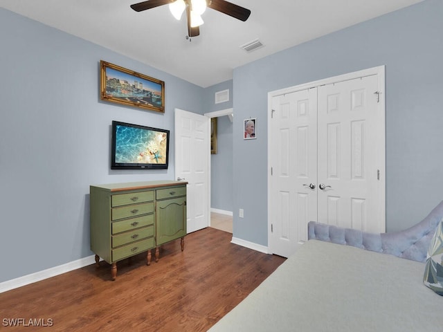 2739 Merida Ln, Cape Coral, FL 33909 - bedroom with dark wood-style floors, visible vents, a closet, baseboards, and ceiling fan