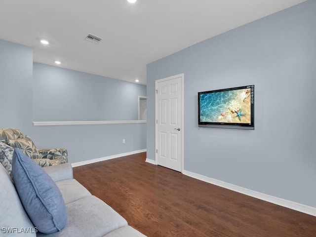2739 Merida Ln, Cape Coral, FL 33909 - living area with baseboards, wood finished floors, visible vents, and recessed lighting