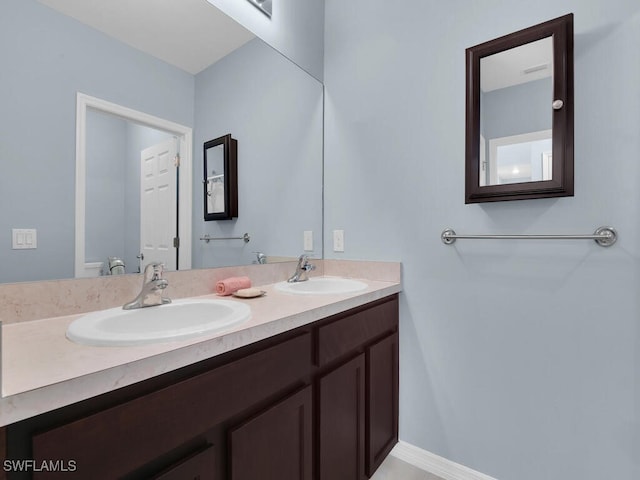 2739 Merida Ln, Cape Coral, FL 33909 - full bath featuring double vanity and a sink
