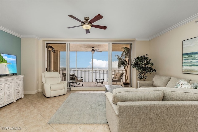 living room featuring ceiling fan, ornamental molding, and light tile patterned floors