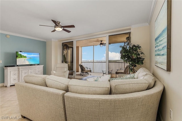 tiled living room featuring ornamental molding and ceiling fan