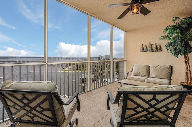 2090 W First St Unit 1609, Fort Myers, FL 33901 - sunroom / solarium featuring a water view, ceiling fan, outdoor lounge area, and a wealth of natural light