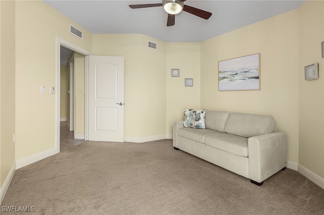 living room with carpet floors and ceiling fan