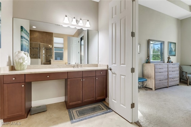 bathroom with vanity, tile patterned floors, and an enclosed shower