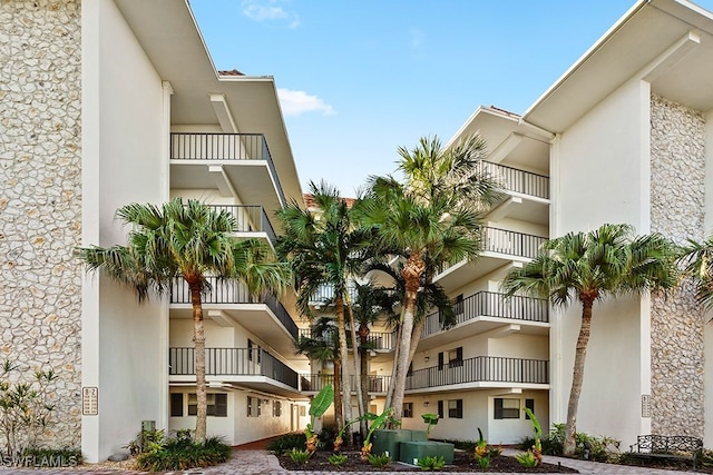 222 Harbour Dr Unit 314, Naples, FL 34103 - view of building exterior featuring cooling unit