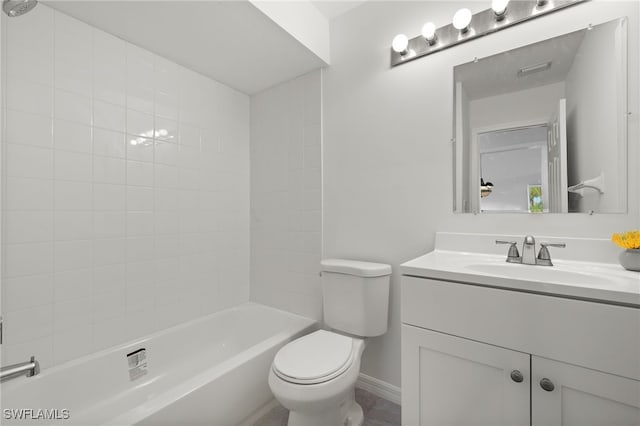 full bathroom featuring vanity, toilet, and tiled shower / bath