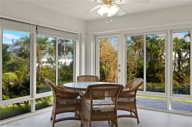 sunroom / solarium with ceiling fan