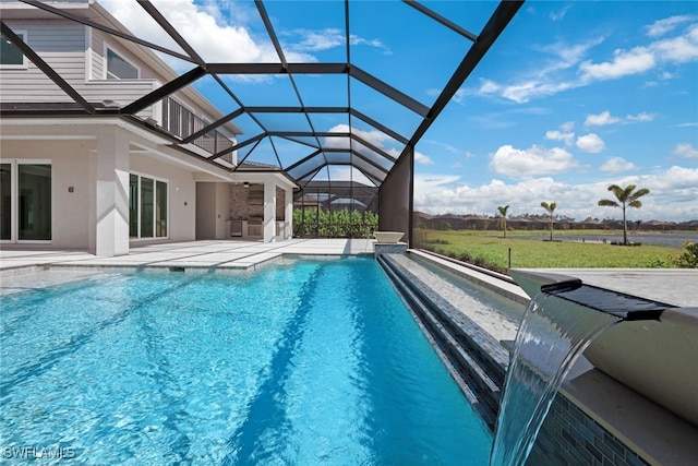 view of pool featuring a patio area, a lanai, and pool water feature