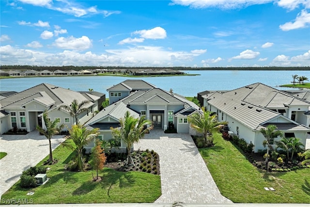 drone / aerial view with a water view