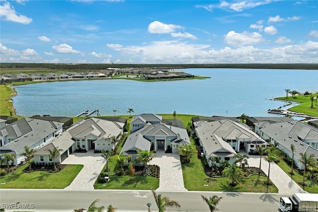 aerial view with a water view and a residential view