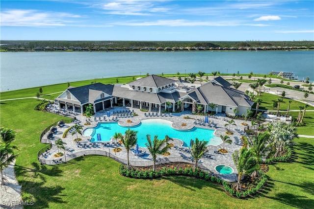 drone / aerial view with a water view