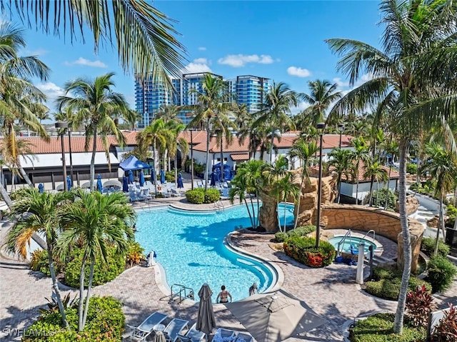 view of swimming pool featuring a patio area